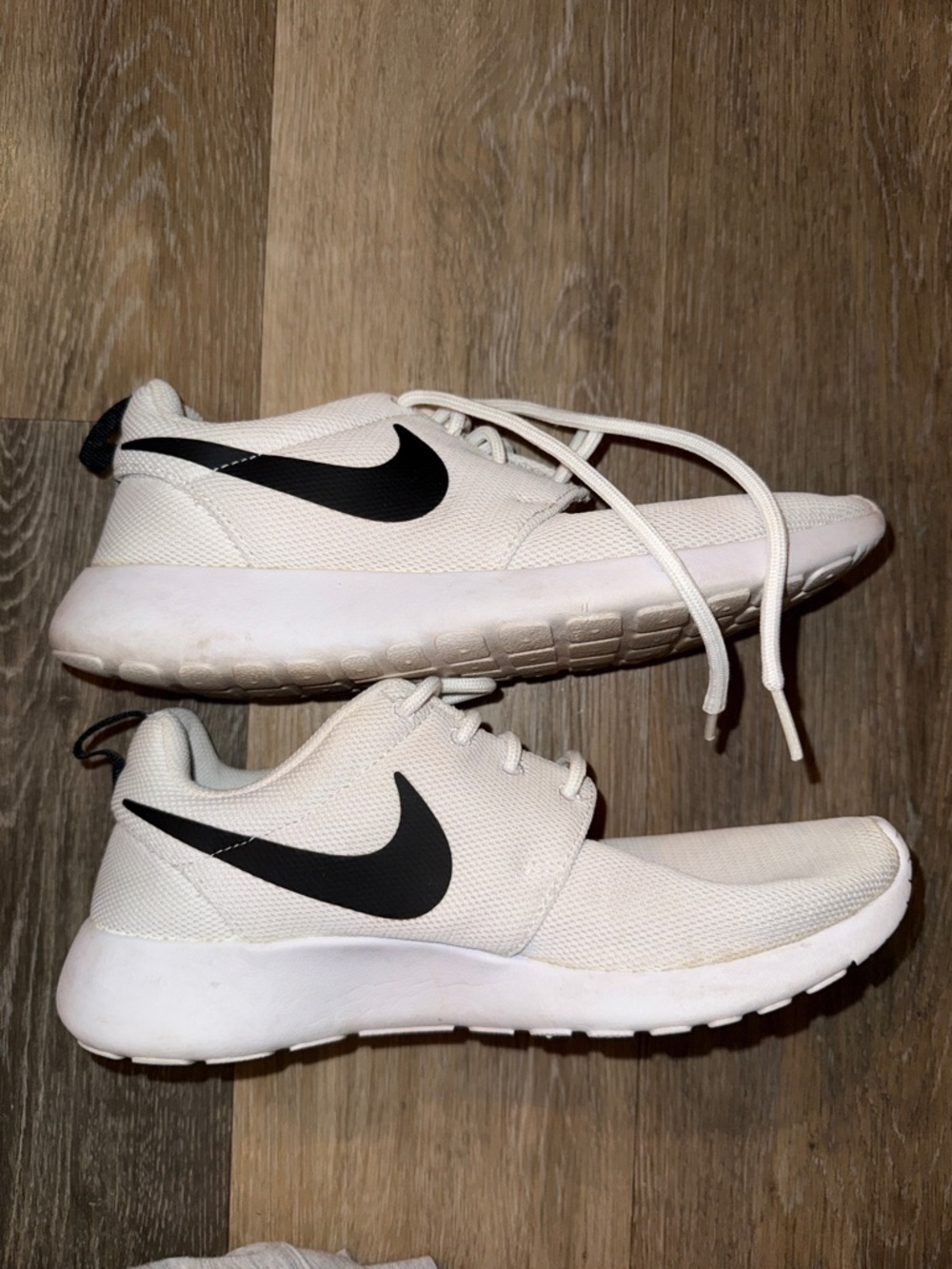 Nike White Mesh Running Shoes with Black Swoosh